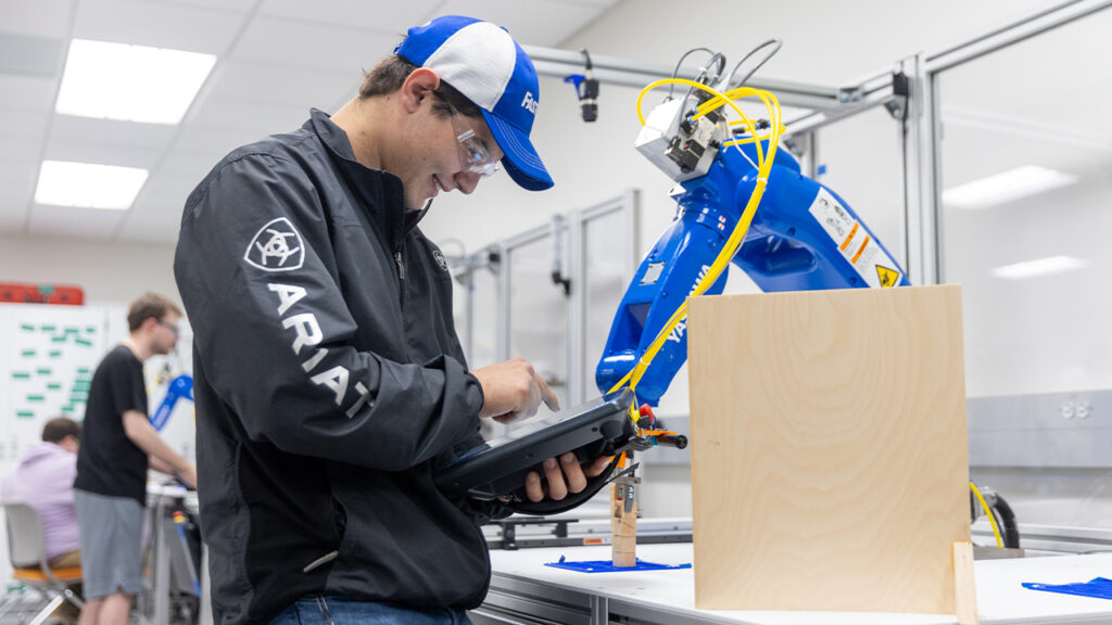 Photo of UW-Platteville student: The unique delivery model combines online courses with hands-on lab experiences at satellite campuses throughout the state. 