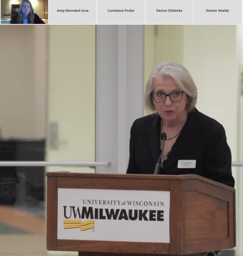 Photo of Regent Cris Peterson introducing Jenice Meyer, UW-Superior