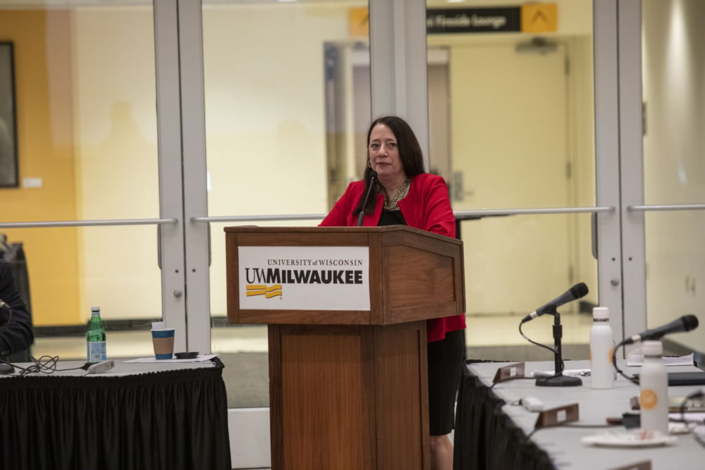 Photo of Regent Vice President Karen Walsh speaking at the podium