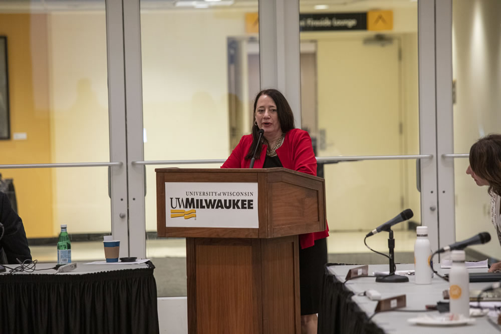 Photo of Regent Vice President Karen Walsh speaking at the podium
